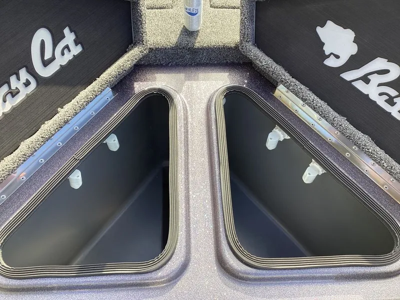 Slide: The Image of Interior of 2026 Bass Cat Puma STS with seat and storage compartment. - 23