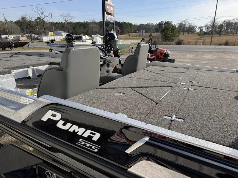 Slide: The Image of Interior of 2026 Bass Cat Puma STS with storage compartment. - 34