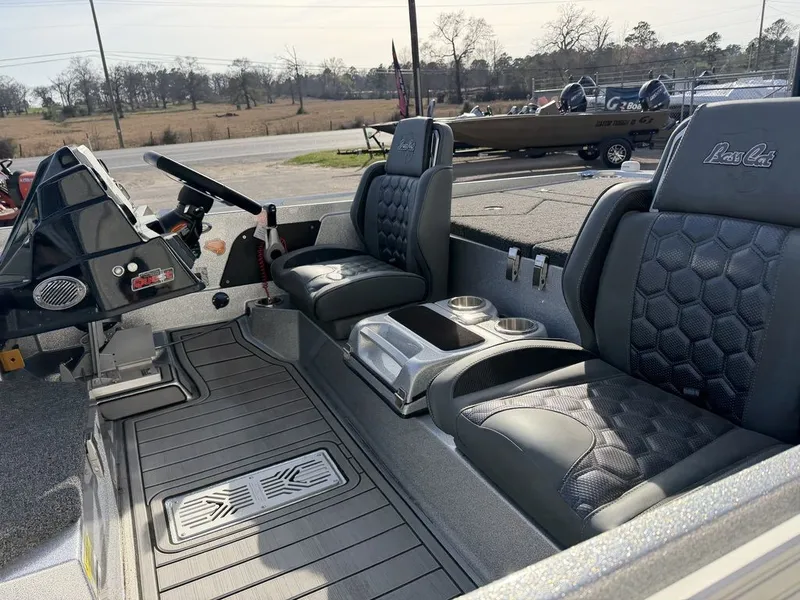 Slide: The Image of 2026 Bass Cat Puma STS boat seat with hexagonal pattern. - 37