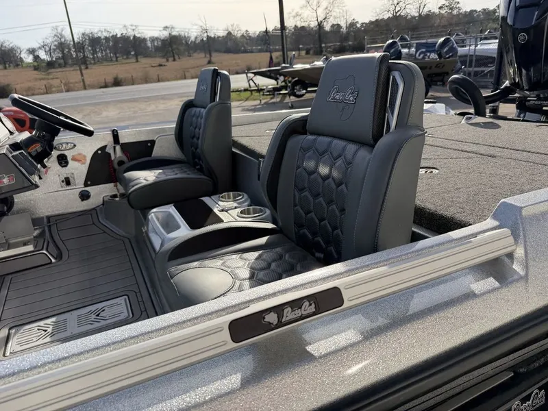 Slide: The Image of 2026 Bass Cat Puma STS boat seat with gray upholstery design. - 38