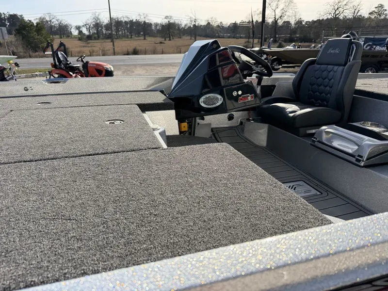 Slide: The Image of Open storage compartment in 2026 Bass Cat Puma STS boat. - 48