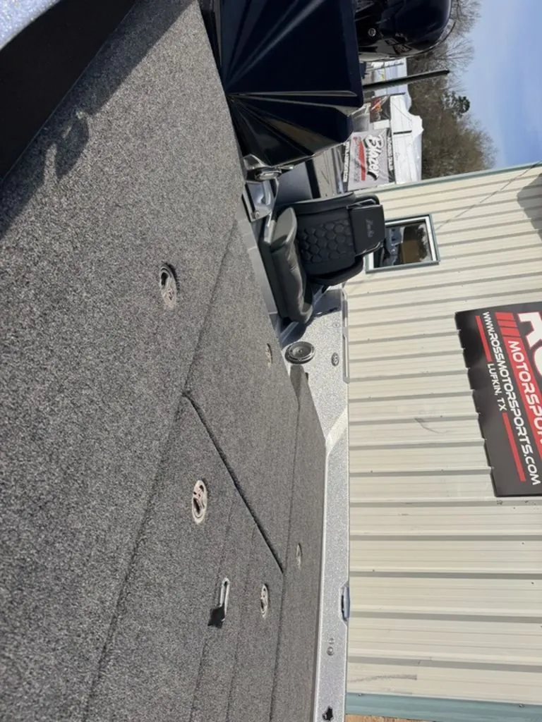 Slide: The Image of Open storage compartment in 2026 Bass Cat Puma STS boat. - 49