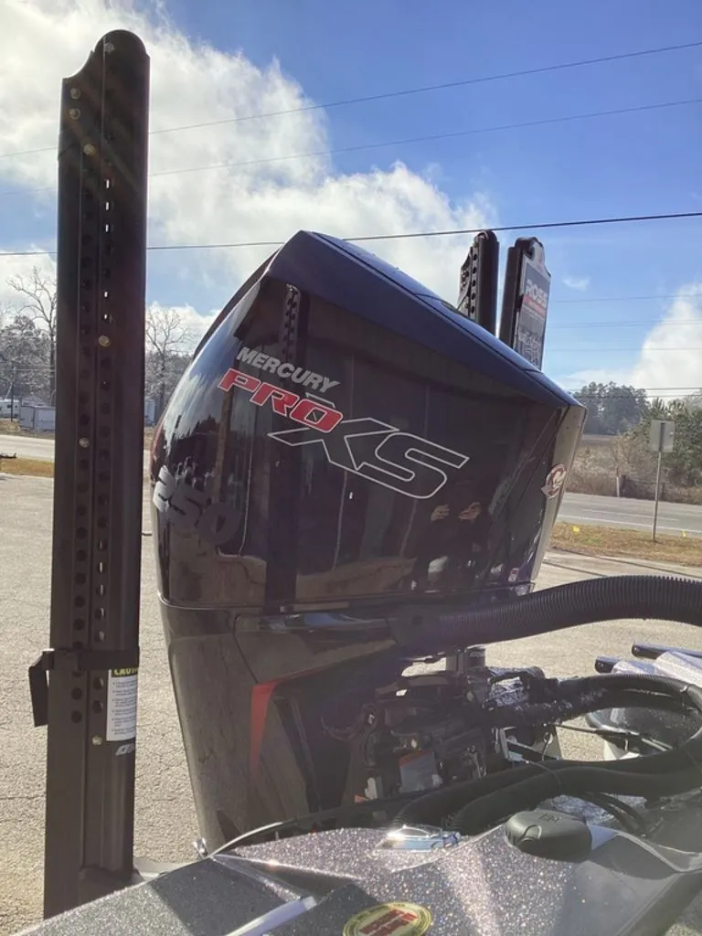 Slide: The Image of 2026 Bass Cat Puma STS boat with powerful outboard motor. - 7