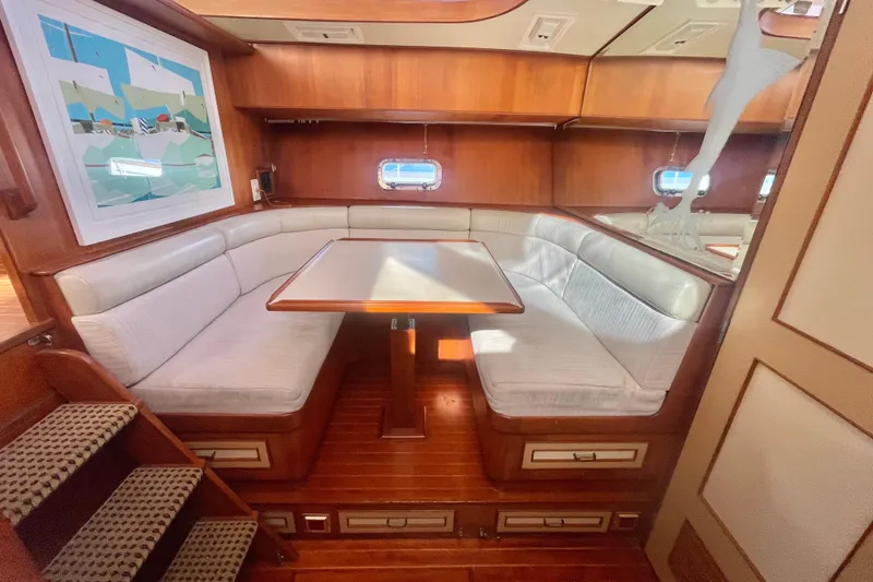 Slide: The Image of Luxurious 1986 Hi-Star Aft Cabin yacht interior with elegant wood finish and cozy seating area. - 33