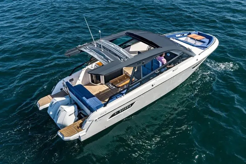 The Image of 2023 Bavaria Vida 33 boat cruising on open water, showcasing sleek design and luxury features. - 1