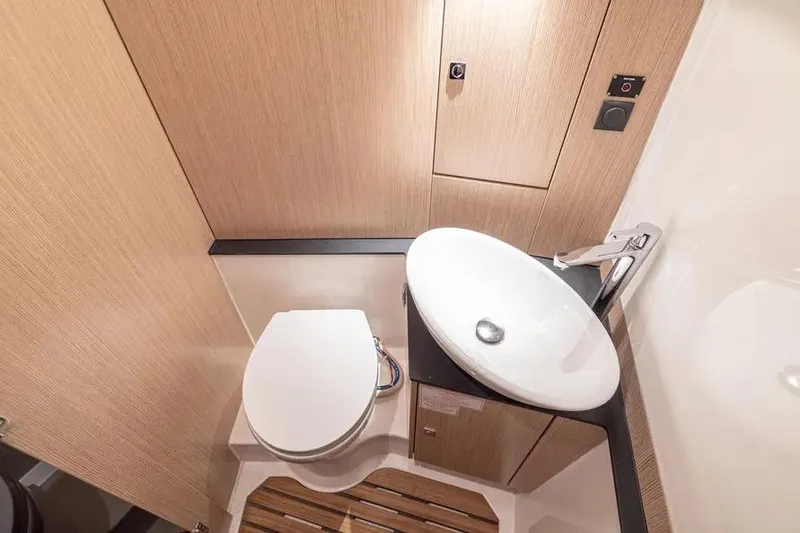 Slide: The Image of Modern bathroom in 2023 Bavaria Vida 33 yacht with sleek sink and toilet. - 10