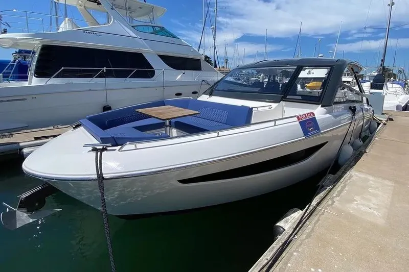 Slide: The Image of 2023 Bavaria Vida 33 yacht docked, featuring sleek design and modern amenities. - 12