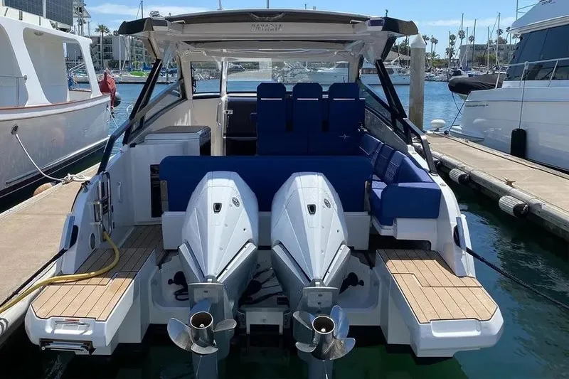 Slide: The Image of 2023 Bavaria Vida 33 yacht with dual engines docked at marina. - 13