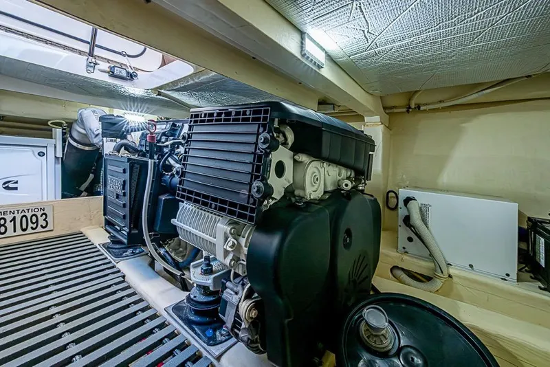 Slide: The Image of Engine room of a 2017 Tiara Yacht Coupe, featuring a Volvo Penta engine. - 17
