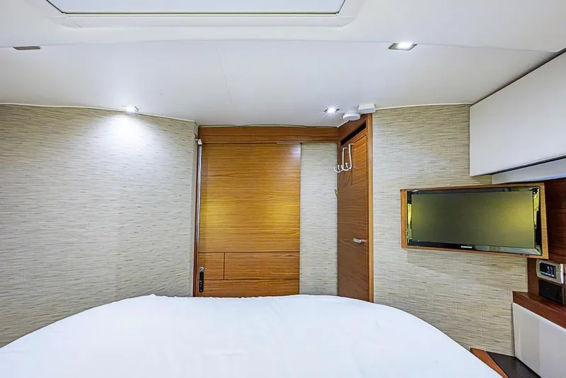 Slide: The Image of Luxurious interior of 2017 Tiara Yacht Coupe with modern design and flat-screen TV. - 24