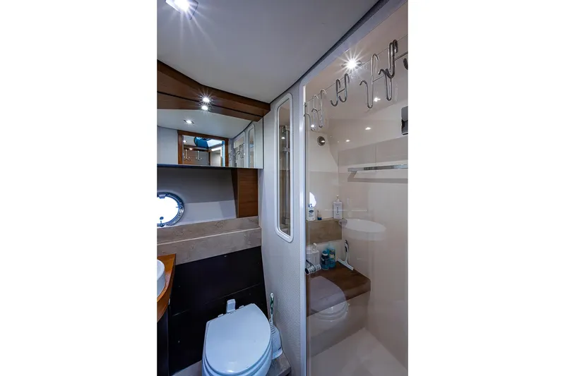 Slide: The Image of Luxurious 2017 Tiara Yacht coupe bathroom with modern fixtures and elegant design. - 28