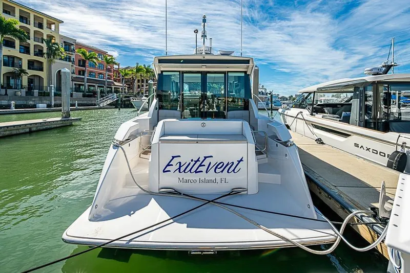Slide: The Image of 2017 Tiara Yacht Coupe docked at Marco Island, Florida marina. - 5