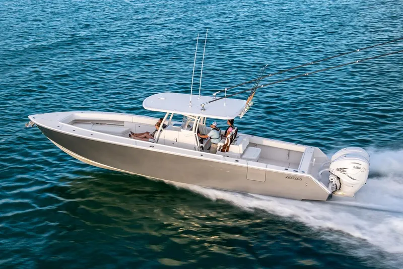 Slide: The Image of Manufacturer Provided Image: 2026 Jupiter 38 boat cruising on open water with passengers onboard. - 1