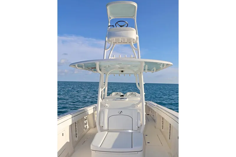 Slide: The Image of Manufacturer Provided Image: 2026 Jupiter 38 boat with tower on open sea under clear sky. - 3