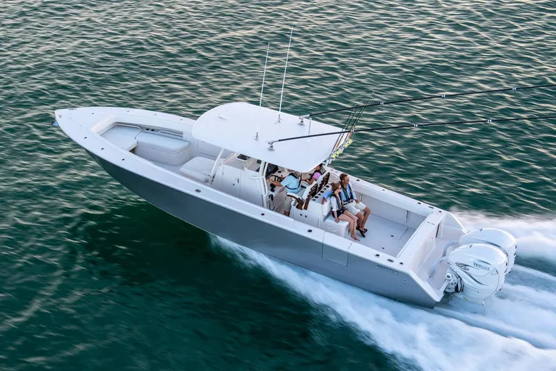 The Image of Manufacturer Provided Image: 2026 Jupiter 38 boat cruising on water with passengers enjoying the ride. - 0