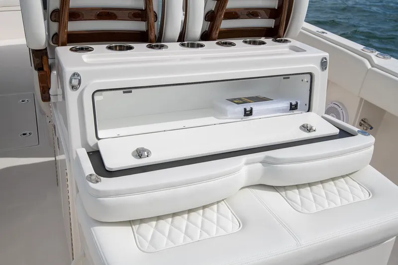 Slide: The Image of Manufacturer Provided Image: 2026 Jupiter 38 boat seating with integrated storage and cup holders. - 8