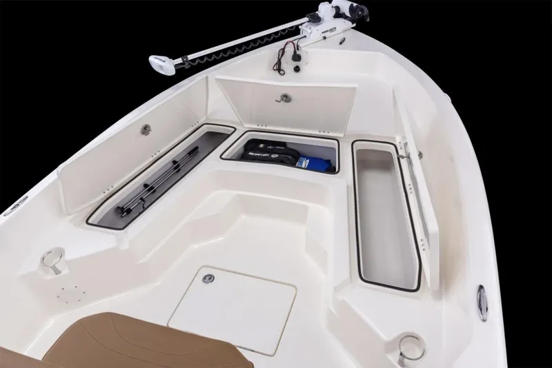 Slide: The Image of Manufacturer Provided Image: 2026 Skeeter SX2350 boat deck with storage compartments and trolling motor. - 13