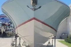 Slide: The Image of 2022 Regulator 41 boat on stands, viewed from the front. - 2
