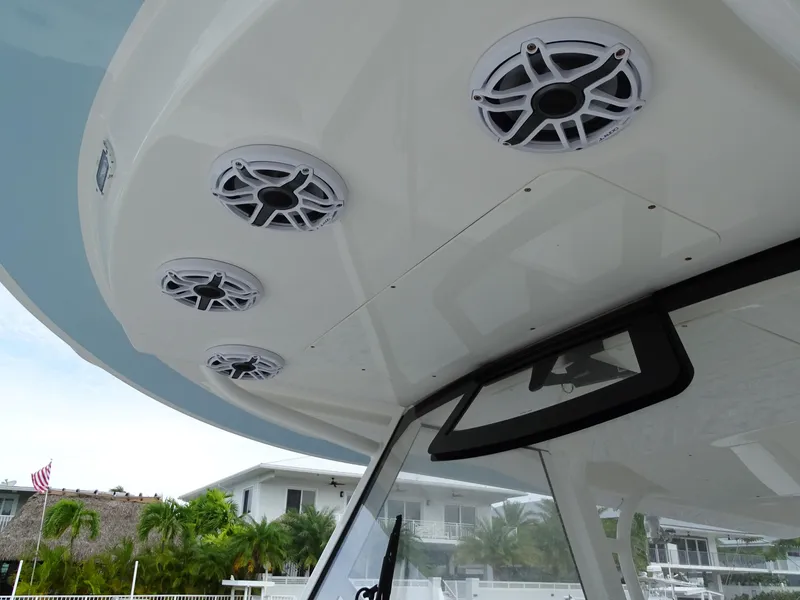 Slide: The Image of Regulator 41 boat speakers and roof detail, 2022 model, with waterfront view. - 28