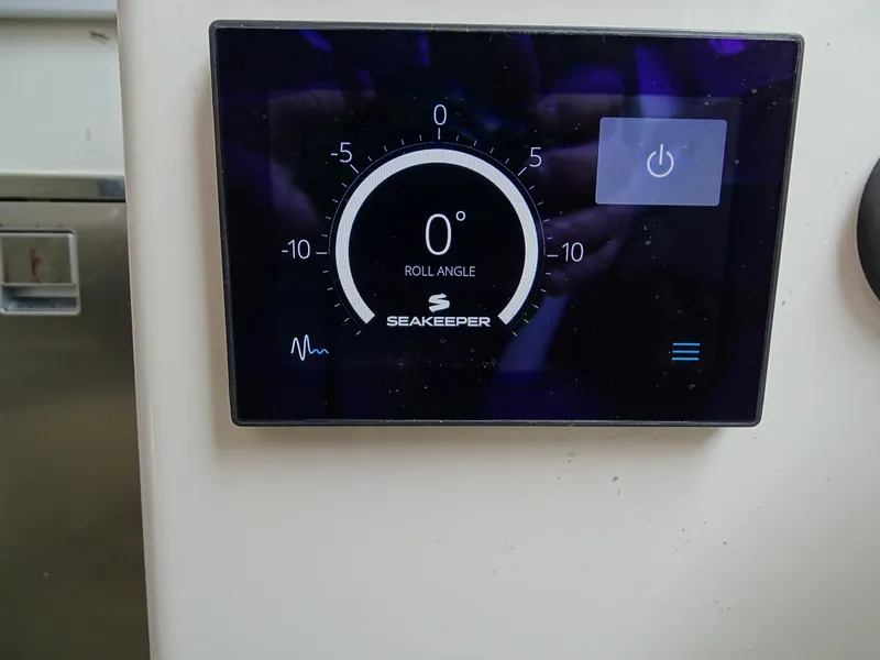 Slide: The Image of Seakeeper control panel on 2022 Regulator 41 boat, displaying roll angle at 0 degrees. - 40