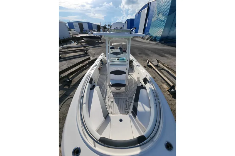 Slide: The Image of 2019 Robalo R242 Center Console boat with sleek design and spacious deck. - 11
