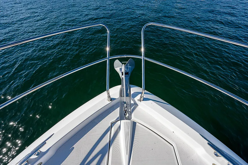 Slide: The Image of Bow of 2022 Beneteau Gran Turismo 45 yacht on open water. - 28