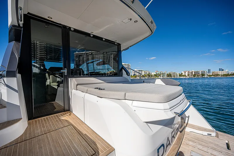 Slide: The Image of 2022 Beneteau Gran Turismo 45 yacht with sun deck and waterfront view. - 36