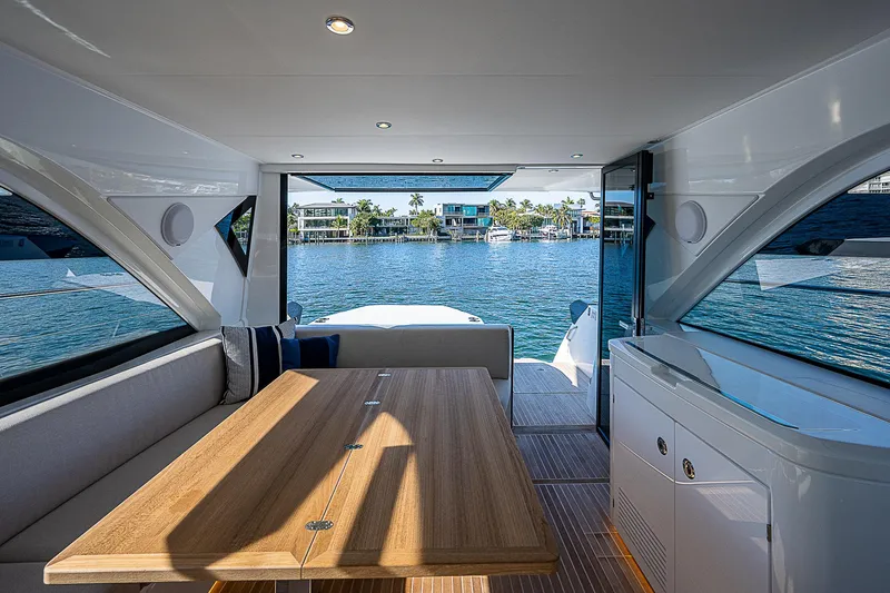 Slide: The Image of Interior of 2022 Beneteau Gran Turismo 45 yacht with waterfront view. - 40