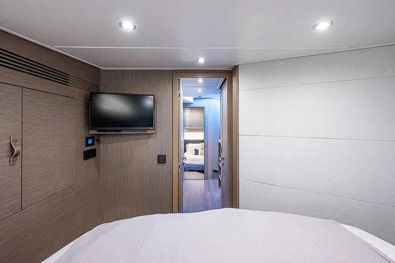 Slide: The Image of Interior cabin of 2022 Beneteau Gran Turismo 45 yacht with TV and modern decor. - 62