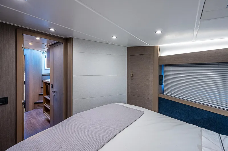 Slide: The Image of Luxurious bedroom interior of 2022 Beneteau Gran Turismo 45 yacht. - 64