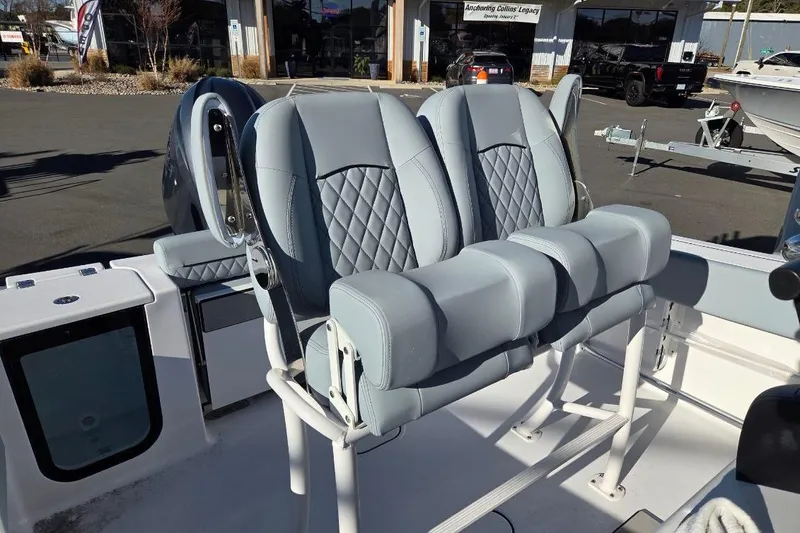 Slide: The Image of 2026 Sportsman Open 212 Center Console boat with stylish seating and modern design. - 11