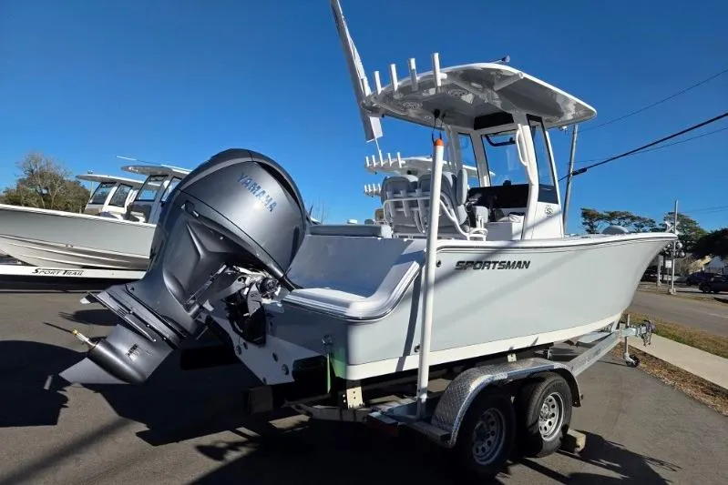 Slide: The Image of 2026 Sportsman Open 212 Center Console boat on trailer, featuring Yamaha outboard motor. - 2