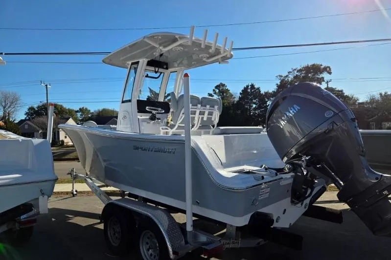 Slide: The Image of 2026 Sportsman Open 212 Center Console boat on trailer, featuring Yamaha outboard motor. - 4
