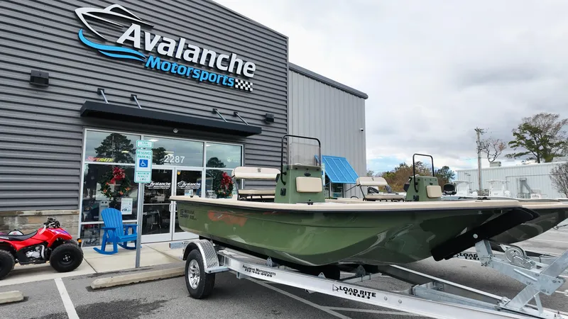 The Image of 2025 Carolina Skiff E18 JVX CC Swamp Edition boat at Avalanche Motorsports dealership. - 1