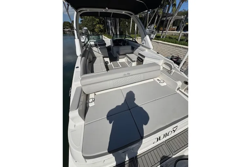 Slide: The Image of 2025 Sea Ray SDX 290 Outboard boat with spacious seating and sleek design. - 35