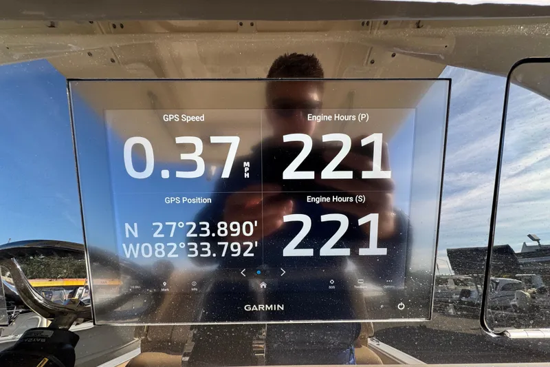 Slide: The Image of 2021 Scout 277 LXF boat display showing GPS speed and engine hours. - 18