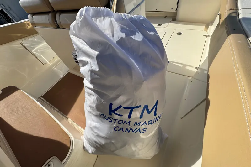 Slide: The Image of 2021 Scout 277 LXF boat interior with KTM Custom Marine Canvas bag. - 30