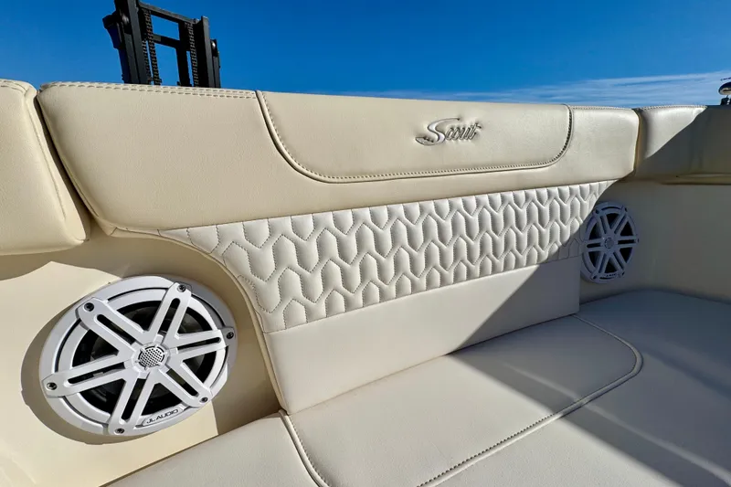 Slide: The Image of Luxurious interior of 2026 Scout 240 XSF boat with premium seating and speakers. - 20