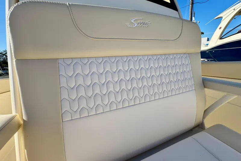 Slide: The Image of 2026 Scout 240 XSF boat seat with elegant stitching and logo detail. - 22