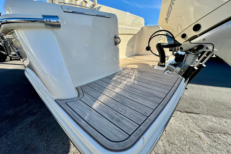 Slide: The Image of 2026 Scout 240 XSF boat deck with sleek design and modern features. - 28