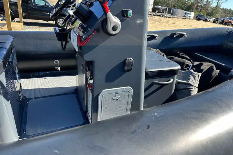 Slide: The Image of 2019 Sealegs 7.1 RIB interior with steering console and seating area. - 11