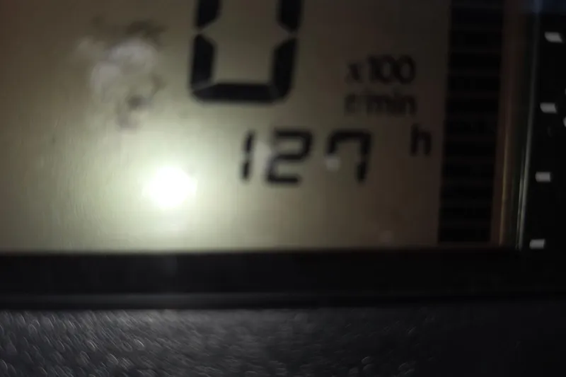 Slide: The Image of Close-up of Sealegs 7.1 RIB 2019 hour meter displaying 127 hours. - 18