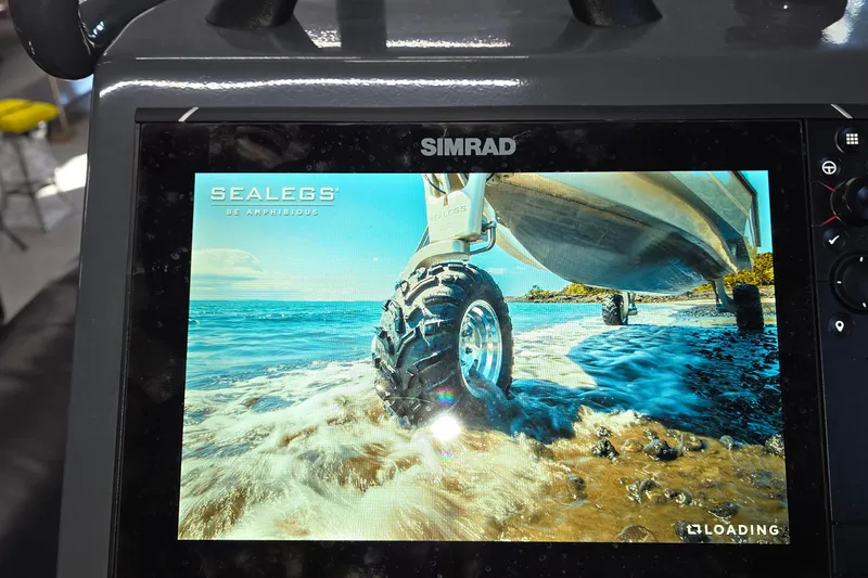 Slide: The Image of Simrad display showing Sealegs 7.1 RIB 2019, featuring amphibious capabilities on a beach. - 21
