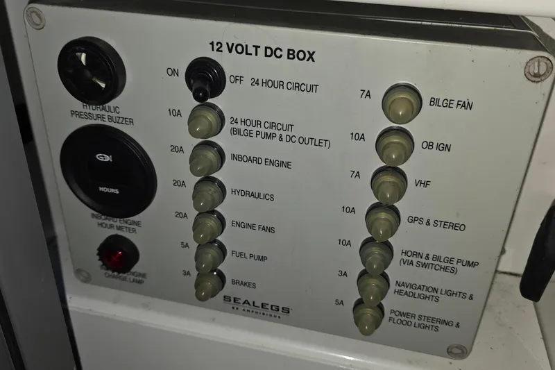Slide: The Image of Control panel of a 2019 Sealegs 7.1 RIB, featuring various switches and indicators. - 29