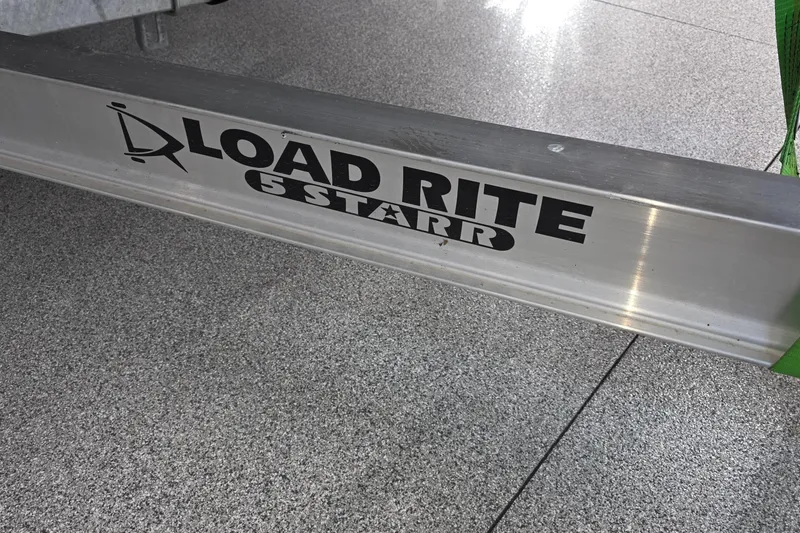 Slide: The Image of Load Rite 5 Starr trailer for 2019 Sealegs 7.1 RIB on concrete floor. - 31