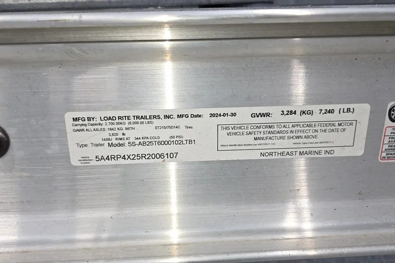 Slide: The Image of Label on Load Rite trailer, showing specifications and compliance details. - 32