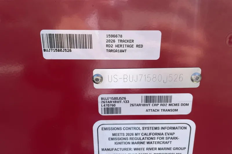 Slide: The Image of 2026 Tracker Targa V-18 WT identification labels on red surface. - 113