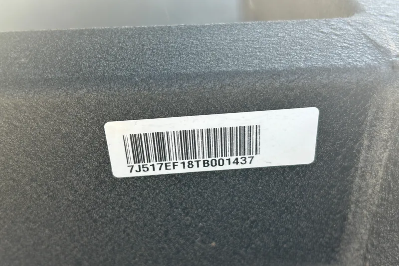 Slide: The Image of Barcode label on 2026 Tracker Grizzly 1648 SC boat surface. - 40