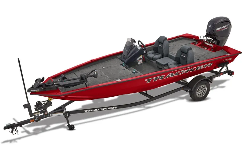 Slide: The Image of 2026 Tracker Pro Team 175 boat with Mercury 75 engine on snowy driveway. - 2