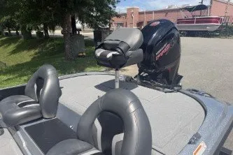 Slide: The Image of 2026 Nitro Z17 boat with sleek seating and powerful engine, parked outdoors. - 7